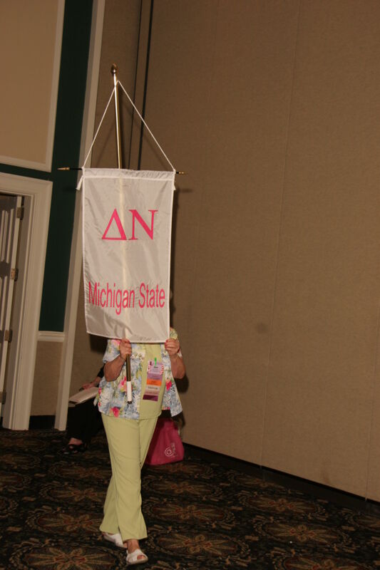 Delta Nu Chapter Flag in Convention Parade Photograph 1, July 2006 (Image)
