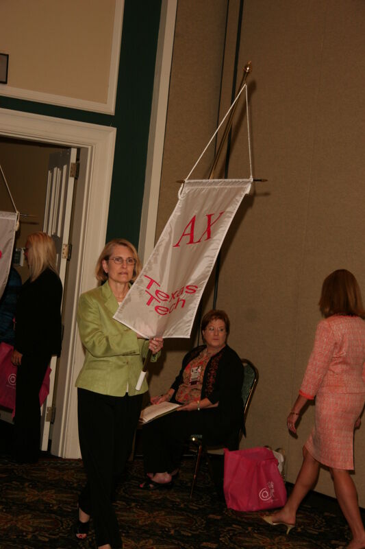 Alpha Chi Chapter Flag in Convention Parade Photograph 1, July 2006 (Image)