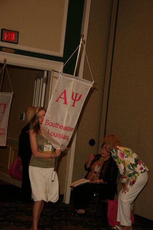 Alpha Psi Chapter Flag in Convention Parade Photograph 1, July 2006 (Image)