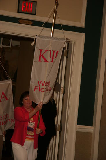 Kappa Psi Chapter Flag in Convention Parade Photograph 1, July 2006 (image)