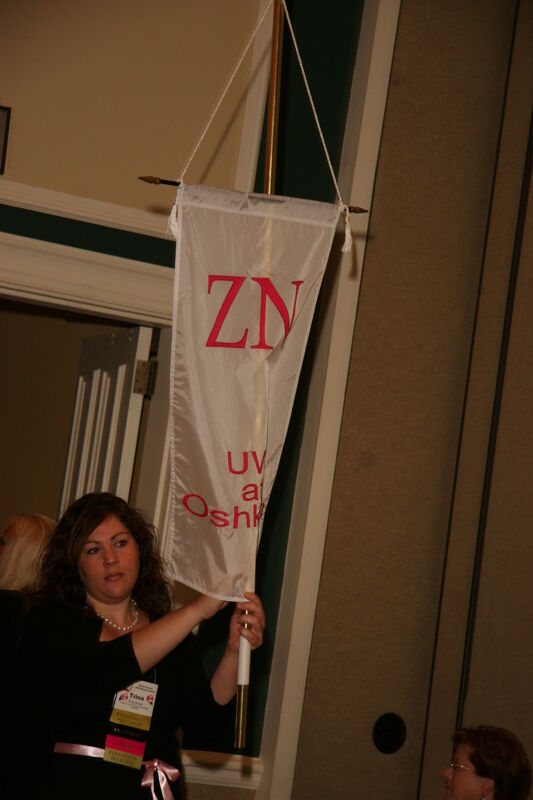 Zeta Nu Chapter Flag in Convention Parade Photograph 1, July 2006 (Image)