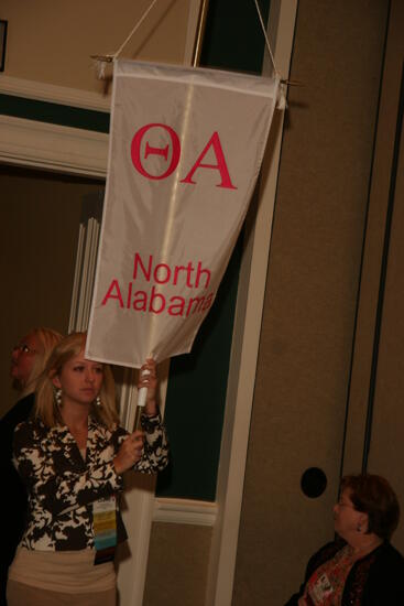 Theta Alpha Chapter Flag in Convention Parade Photograph 1, July 2006 (image)