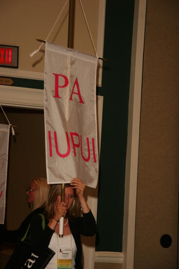 Rho Alpha Chapter Flag in Convention Parade Photograph 1, July 2006 (image)