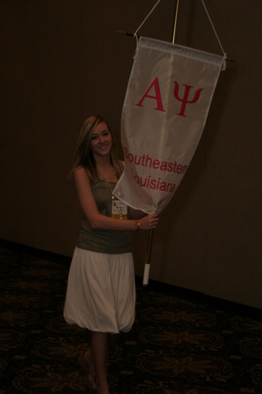 Alpha Psi Chapter Flag in Convention Parade Photograph 2, July 2006 (Image)