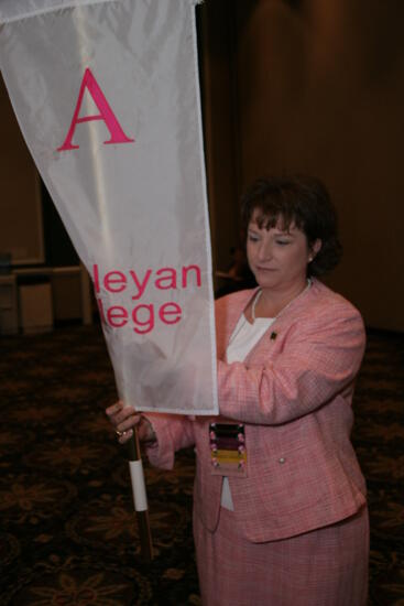 Frances Mitchelson With Alpha Chapter Flag at Convention Photograph 3, July 2006 (image)