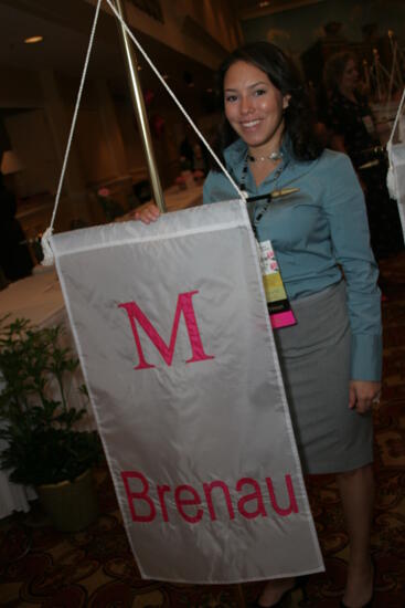 Unidentified Phi Mu With Mu Chapter Flag at Convention Photograph 1, July 2006 (image)