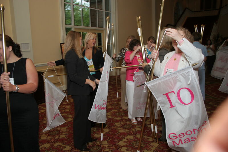 July 2006 Phi Mus Putting Flags on Poles at Convention Photograph Image