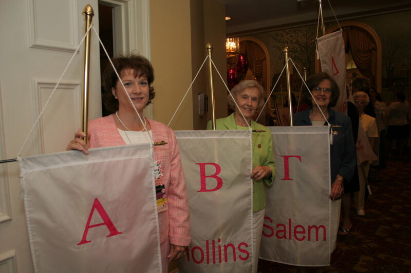 Mitchelson, Lamb, and Wallem With Chapter Flags in Convention Parade Photograph, July 2006 (Image)