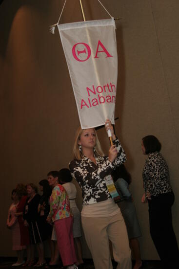 Theta Alpha Chapter Flag in Convention Parade Photograph 2, July 2006 (image)