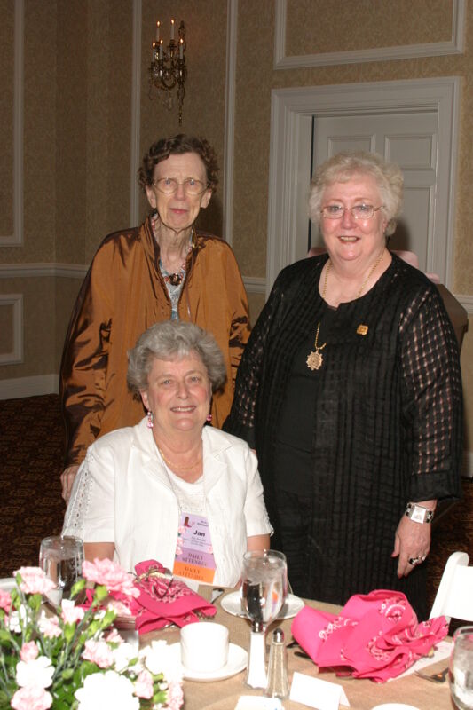 Arnold, Nemir, and Unidentified at Convention 1852 Dinner Photograph, July 14, 2006 (Image)