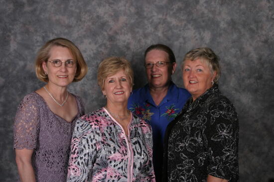 Donna Stallard and Three Unidentified Phi Mus Convention Portrait Photograph 2, July 2006 (image)