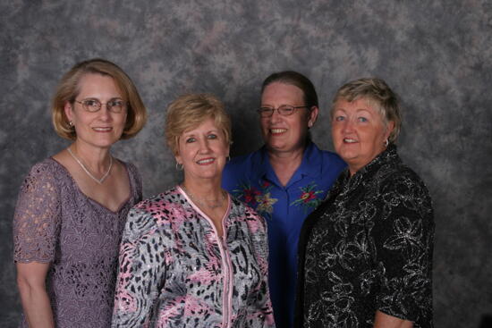 Donna Stallard and Three Unidentified Phi Mus Convention Portrait Photograph 1, July 2006 (image)