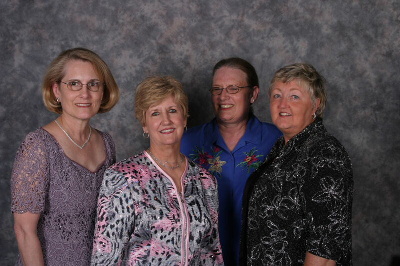 Donna Stallard and Three Unidentified Phi Mus Convention Portrait Photograph 1, July 2006 (Image)