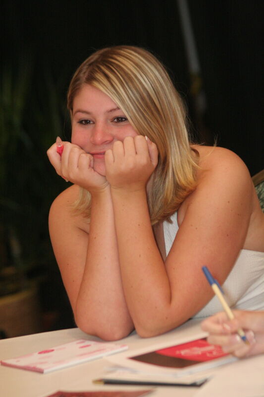 Unidentified Phi Mu With Hands on Chin at Convention Photograph, July 2006 (Image)