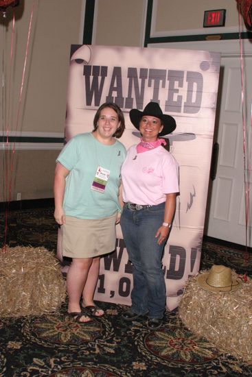 Kristi Wachtel and Unidentified by Wanted Poster at Convention Photograph, July 2006 (image)