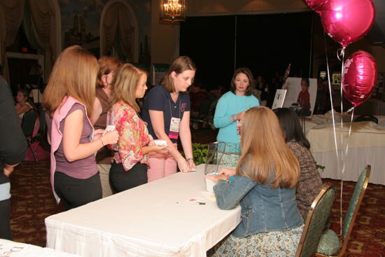 Phi Mus at Table Before Friday Convention Session Photograph 1, July 14, 2006 (image)