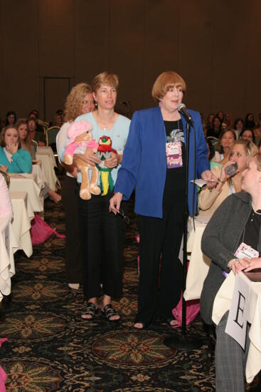 Dusty Manson and Others and Microphone at Friday Convention Session Photograph 2, July 14, 2006 (image)