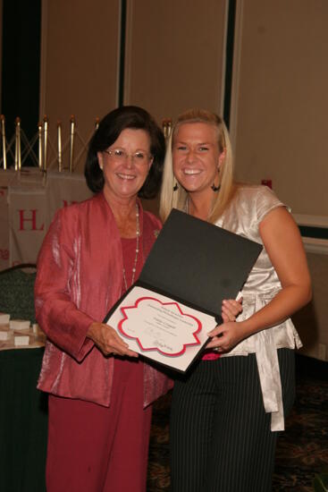 Shellye McCarty and Emily Crossett With Certificate at Friday Convention Session Photograph, July 14, 2006 (image)