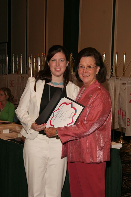 Shellye McCarty and Julie Pline With Certificate at Friday Convention Session Photograph, July 14, 2006 (Image)