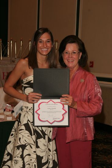 Shellye McCarty and Katie Chaulk With Certificate at Friday Convention Session Photograph, July 14, 2006 (image)