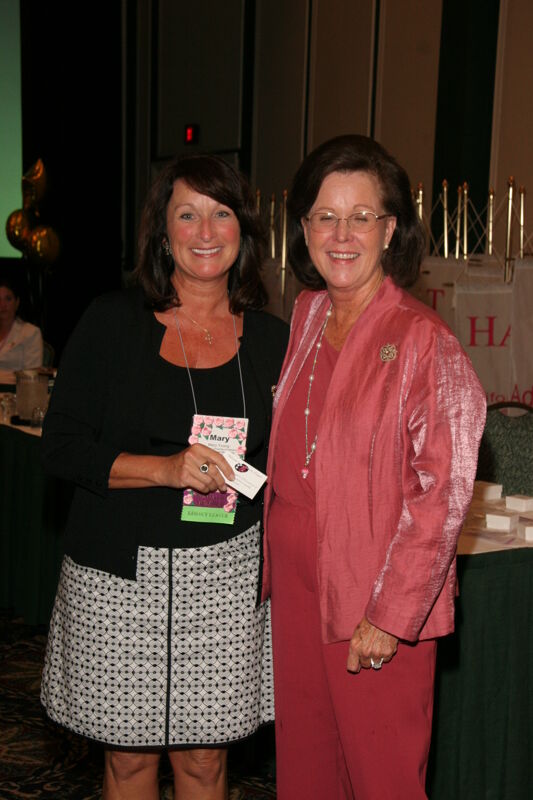 Shellye McCarty and Mary Young With Pin at Friday Convention Session Photograph 1, July 14, 2006 (Image)