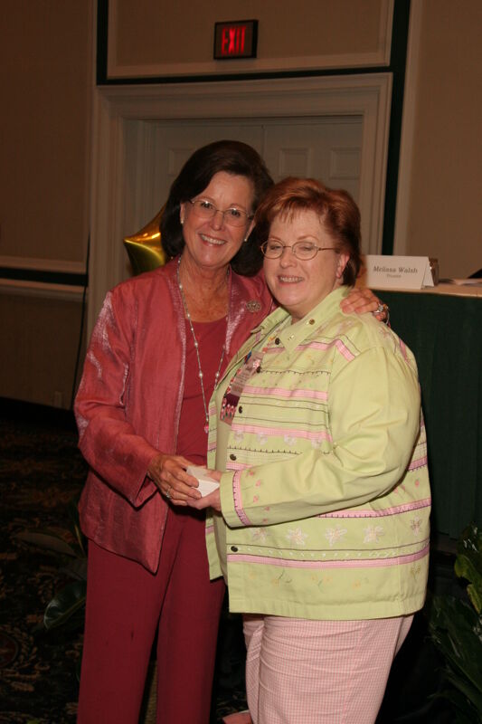 Shellye McCarty and Unidentified With Pin at Friday Convention Session Photograph 1, July 14, 2006 (Image)
