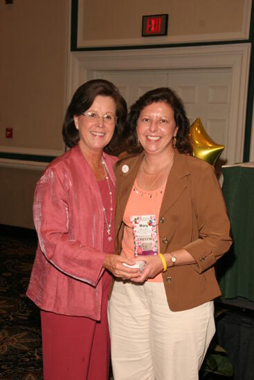 Shellye McCarty and Mary Ganim With Pin at Friday Convention Session Photograph, July 14, 2006 (image)