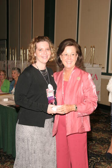 Shellye McCarty and Ashlee Forscher With Pin at Friday Convention Session Photograph, July 14, 2006 (image)