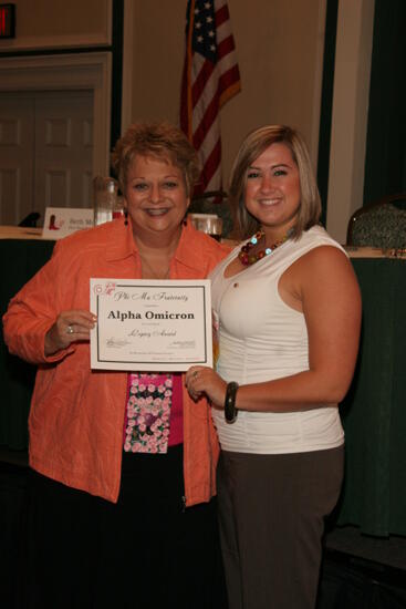 Kathy Williams and Alpha Omicron Chapter Member With Legacy Award at Friday Convention Session Photograph, July 14, 2006 (image)