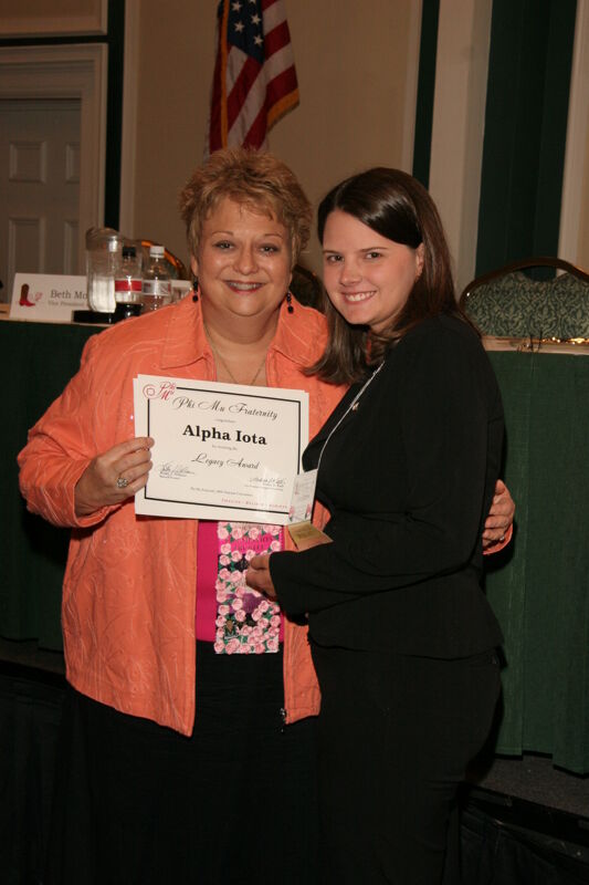 Kathy Williams and Alpha Iota Chapter Member With Legacy Award at Friday Convention Session Photograph, July 14, 2006 (Image)