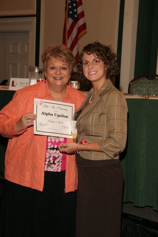 July 14 Kathy Williams and Alpha Upsilon Chapter Member With Legacy Award at Friday Convention Session Photograph Image