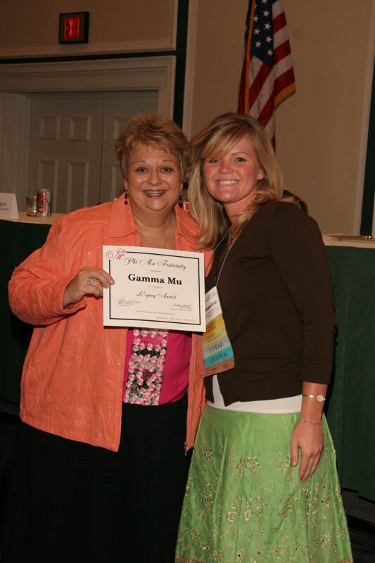 Kathy Williams and Gamma Mu Chapter Member With Legacy Award at Friday Convention Session Photograph, July 14, 2006 (Image)