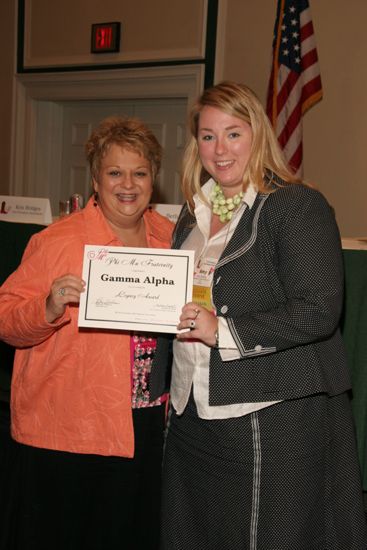 Kathy Williams and Gamma Alpha Chapter Member With Legacy Award at Friday Convention Session Photograph, July 14, 2006 (image)