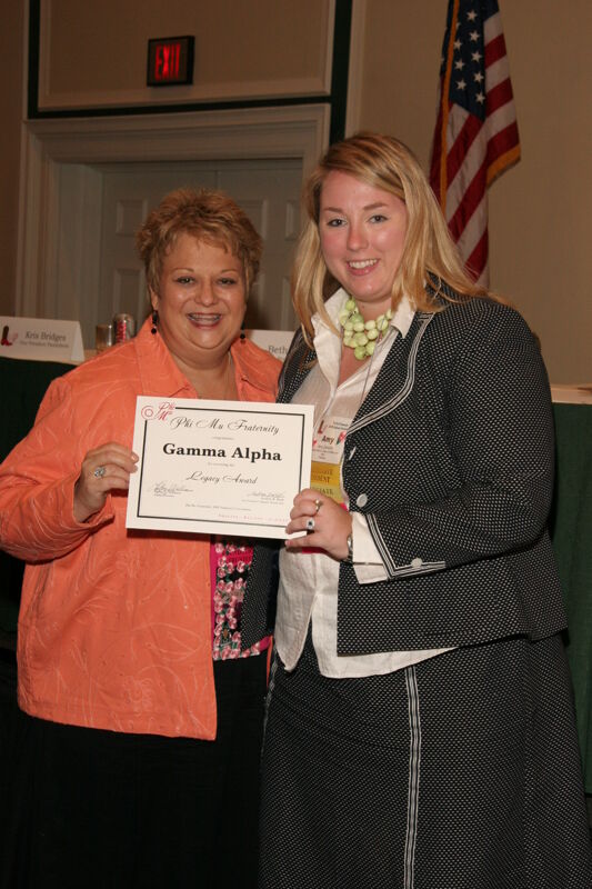 July 14 Kathy Williams and Gamma Alpha Chapter Member With Legacy Award at Friday Convention Session Photograph Image