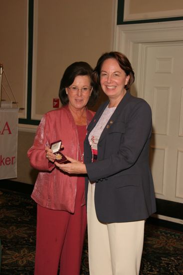 Shellye McCarty and Nancy Campbell With Pin at Friday Convention Session Photograph, July 14, 2006 (image)