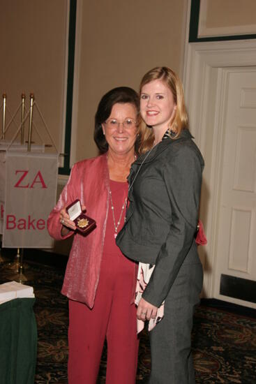 Shellye McCarty and Unidentified With Pin at Friday Convention Session Photograph 2, July 14, 2006 (image)