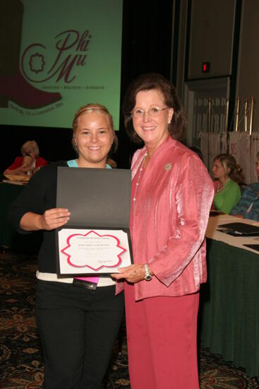 Shellye McCarty and Rho Beta Chapter Member With Certificate at Friday Convention Session Photograph, July 14, 2006 (image)