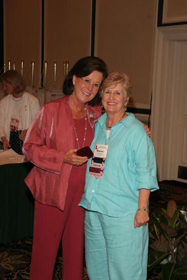 Shellye McCarty and Sharon Staley With Pin at Friday Convention Session Photograph, July 14, 2006 (image)