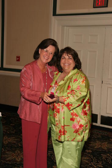 Shellye McCarty and Margo Grace With Pin at Friday Convention Session Photograph, July 14, 2006 (image)