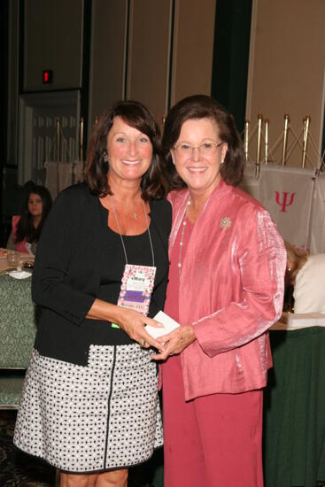 Shellye McCarty and Mary Young With Pin at Friday Convention Session Photograph 2, July 14, 2006 (image)