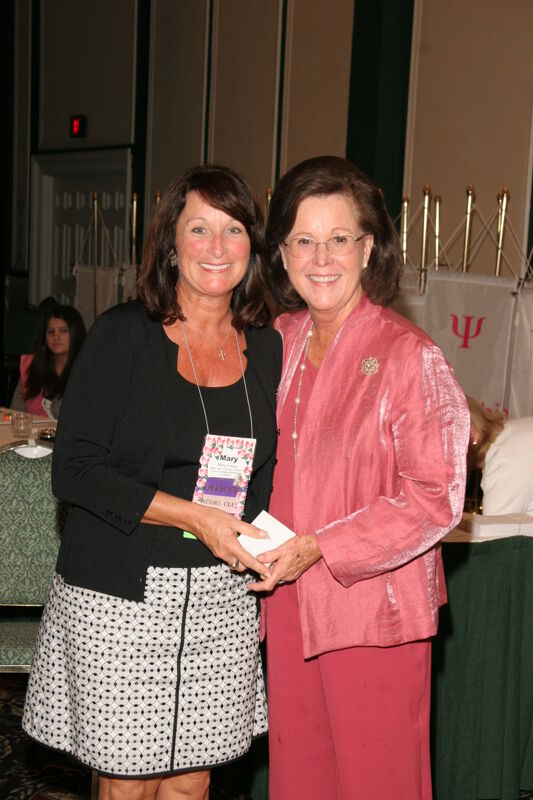 Shellye McCarty and Mary Young With Pin at Friday Convention Session Photograph 2, July 14, 2006 (Image)