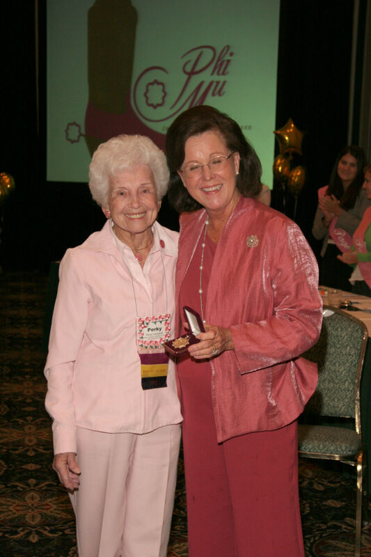 Shellye McCarty and Perky Campbell With Pin at Friday Convention Session Photograph, July 14, 2006 (Image)