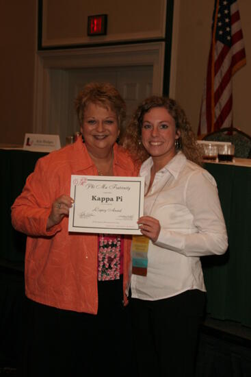 Kathy Williams and Kappa Pi Chapter Member With Legacy Award at Friday Convention Session Photograph, July 14, 2006 (image)