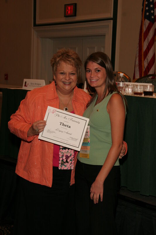 Kathy Williams and Theta Chapter Member With Legacy Award at Friday Convention Session Photograph, July 14, 2006 (Image)