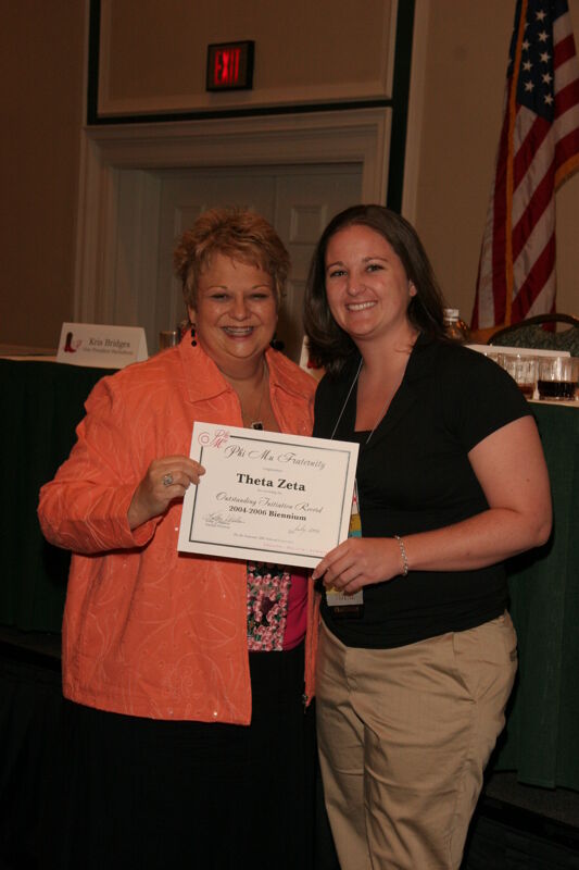 July 14 Kathy Williams and Theta Zeta Chapter Member With Certificate at Friday Convention Session Photograph Image