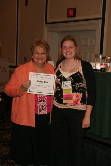 Kathy Williams and Delta Eta Chapter Member With Certificate at Friday Convention Session Photograph, July 14, 2006 (image)