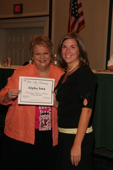 Kathy Williams and Alpha Iota Chapter Member With Certificate at Friday Convention Session Photograph, July 14, 2006 (image)