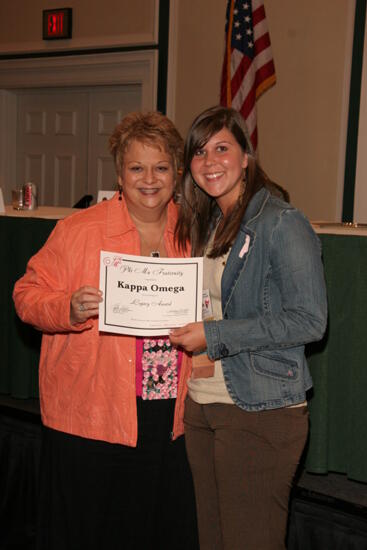 Kathy Williams and Kappa Omega Chapter Member With Legacy Award at Friday Convention Session Photograph, July 14, 2006 (image)