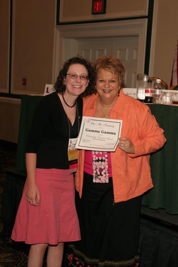 Kathy Williams and Gamma Gamma Chapter Member With Certificate at Friday Convention Session Photograph, July 14, 2006 (image)