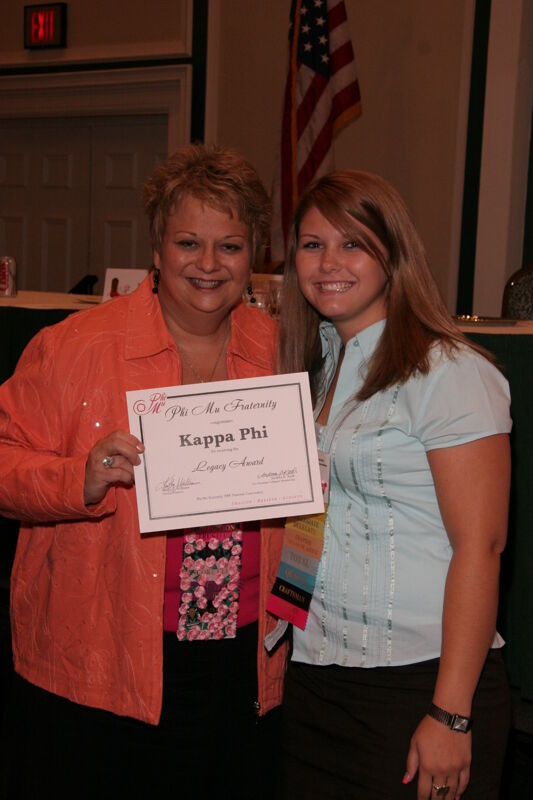 Kathy Williams and Kappa Phi Chapter Member With Legacy Award at Friday Convention Session Photograph, July 14, 2006 (Image)